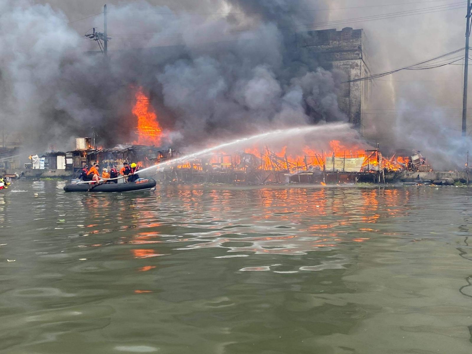 cargo ship catches fire near Delpan Bridge in Manila