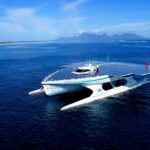 Experimental solar-powered yacht on fire; crew evacuated